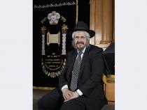 Rabbi Shea Harlig poses in the sanctuary of the Chabad of Las Vegas at 1261 Arville Street.