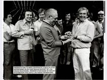 Presentation to Merv Griffin of a gold plated microphone in his continuing support of Las Vegas