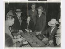 Photograph of people playing Faro game at Golden Nugget, 1930s