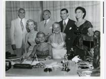 Sam Tucker (standing, far left), with  Wilbur Clark, unidentified man, Toni Clark, Seated: Jane Keen, Betty Keen, Mrs. Tucker