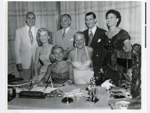 Sam Tucker (standing, far left), with  Wilbur Clark, unidentified man, Toni Clark, Seated: Jane Keen, Betty Keen, Mrs. Tucker
