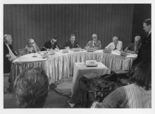 Dick Hannah (standing at far right) at the 1972 telephone press conference with Hughes, who was in the Bahamas. The press conference was a media event designed to dispel rumors of Hughes death, the collapse of his Nevada Empire, and the Clifford Irving-Hughes Autobiography hoax.