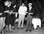 Photograph of the Copa Girls rehearsing with Jack Entratter and Frank Sinatra, Las Vegas, 1954