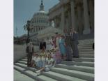 Film negative of group of people including Senator Chic Hecht standing on the Capitol steps, June 28, 1988