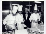 Nat Hart in the kitchen at the Desert Inn with chefs, circa 1990